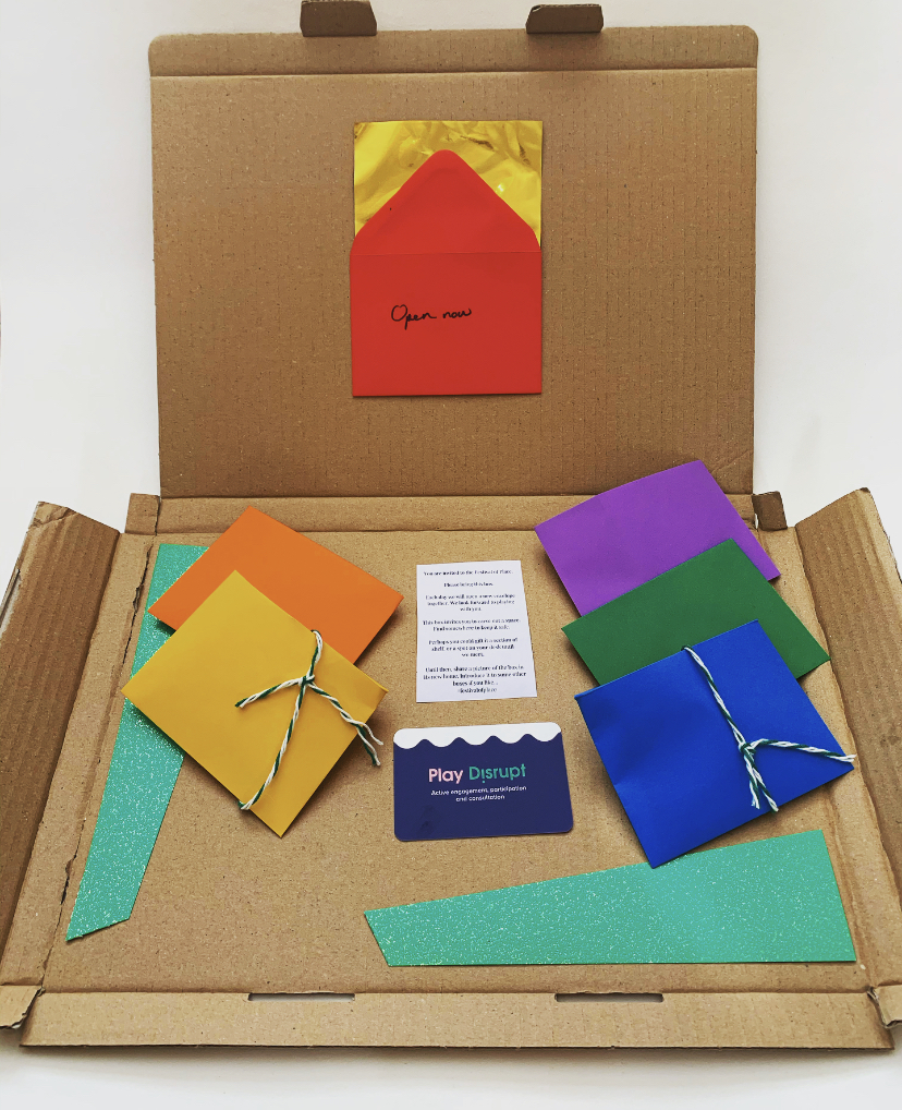 The inside of a Participation Box with multicoloured envelopes